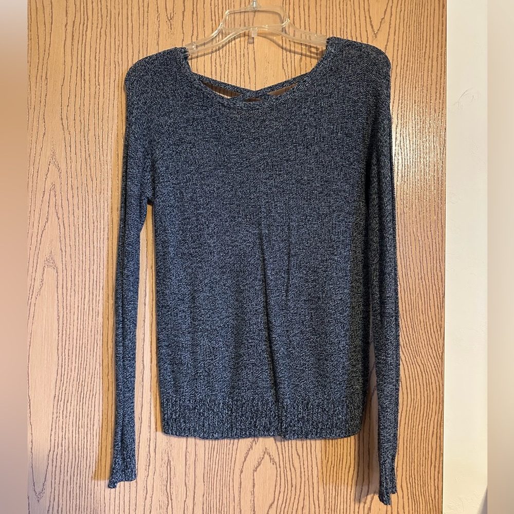 Gray long sleeved sweater with crisscross in back